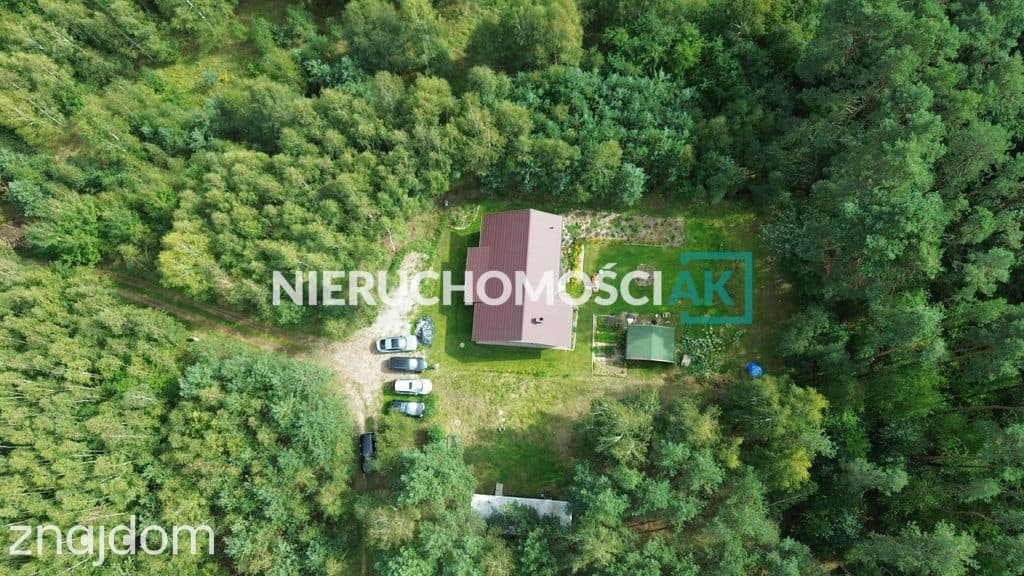 Dom w lesie- sielski klimat w nowoczesnym wydaniu - zdjęcie 2