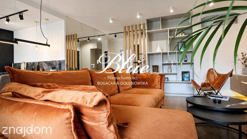 Apartament zaprojektowany przez architekta z tarasem w zieleni