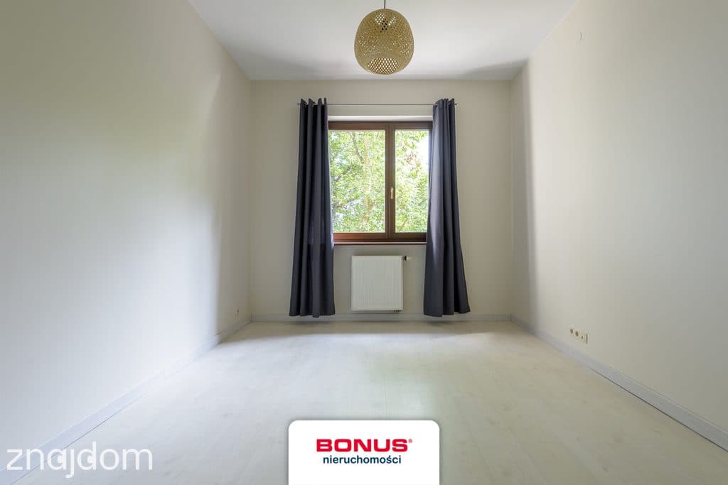 Elegancki apartament z 2 miejscami postojowymi - zdjęcie 9
