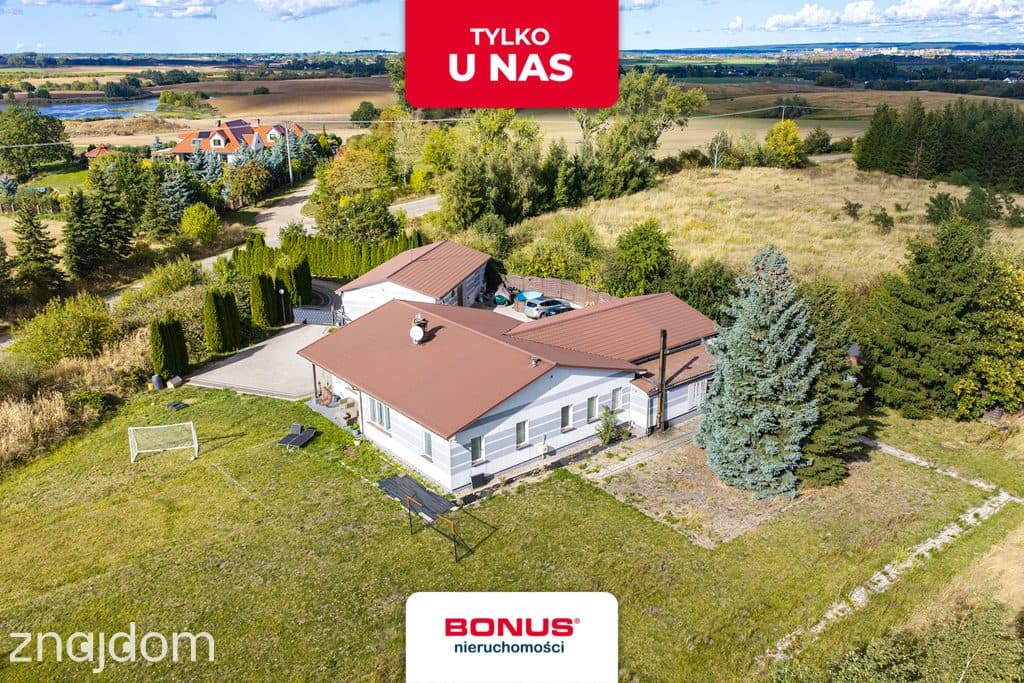 Dom 250 m² z garażem i działką inwestycyjną 2,36 h