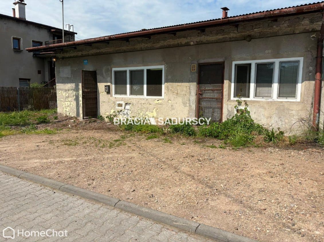 Działka budowlana 300m2 z budynkiem: gaz,prąd,woda