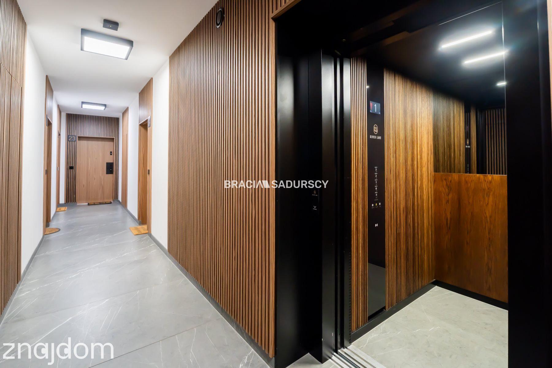Nowoczesny jasny apartament w otoczeniu zieleni - zdjęcie 2