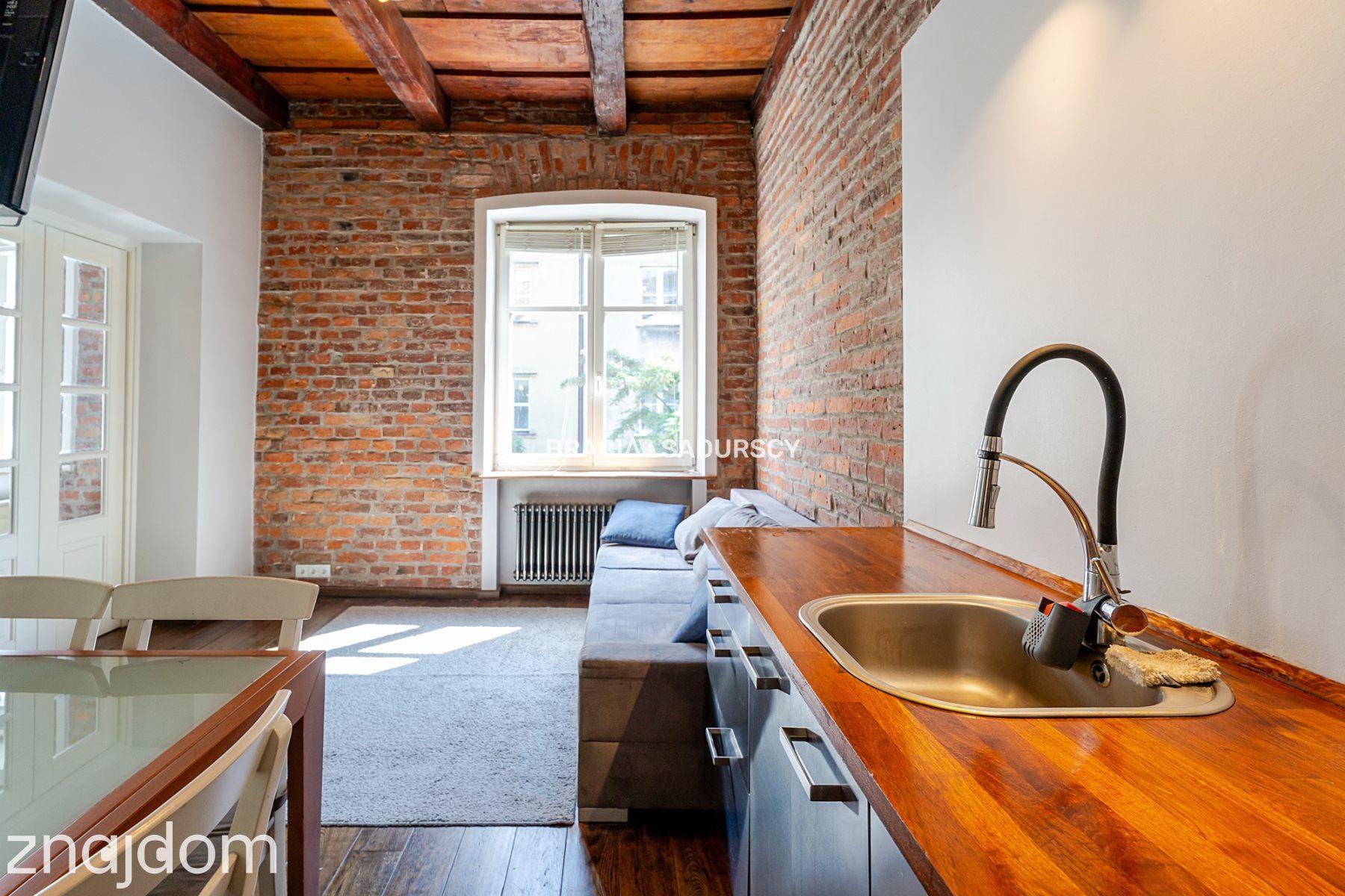 Dwupokojowy apartament z historycznym charakterem - zdjęcie 17