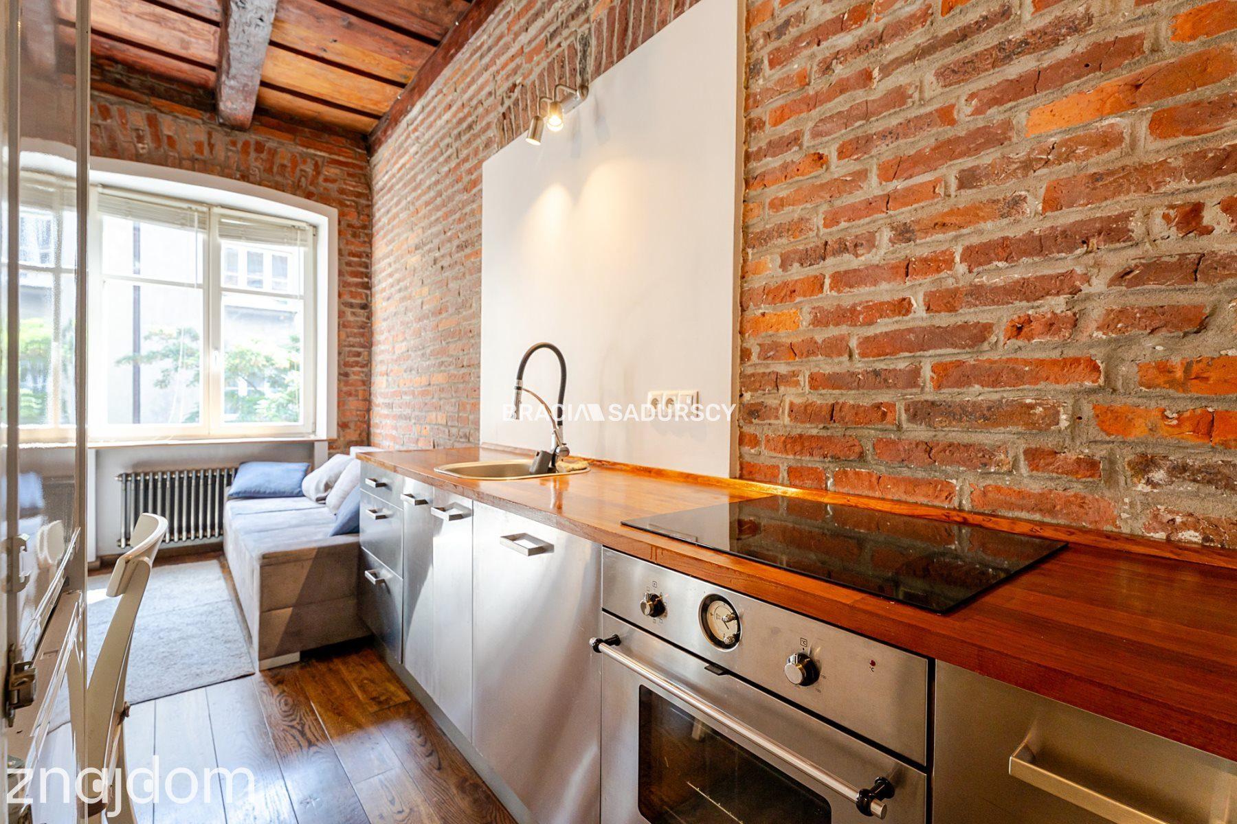 Dwupokojowy apartament z historycznym charakterem - zdjęcie 7