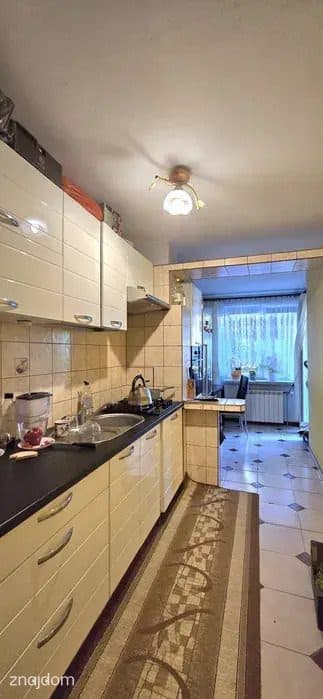 Trzypokojowe mieszkanie z balkonem na parterze - zdjęcie 2