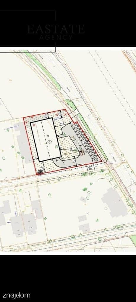 Działka budowlana 1635 m² z asfaltem i ogrodzeniem