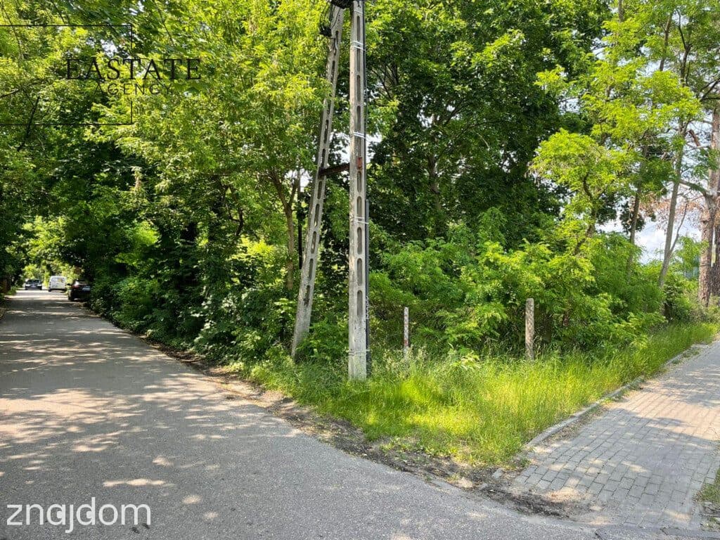 Działka budowlana 1635 m² z asfaltem i ogrodzeniem - zdjęcie 8