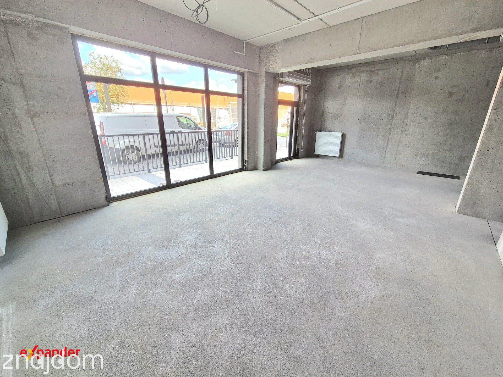 Lokal na Starym Mieście w apartamentowcu nad rzeką