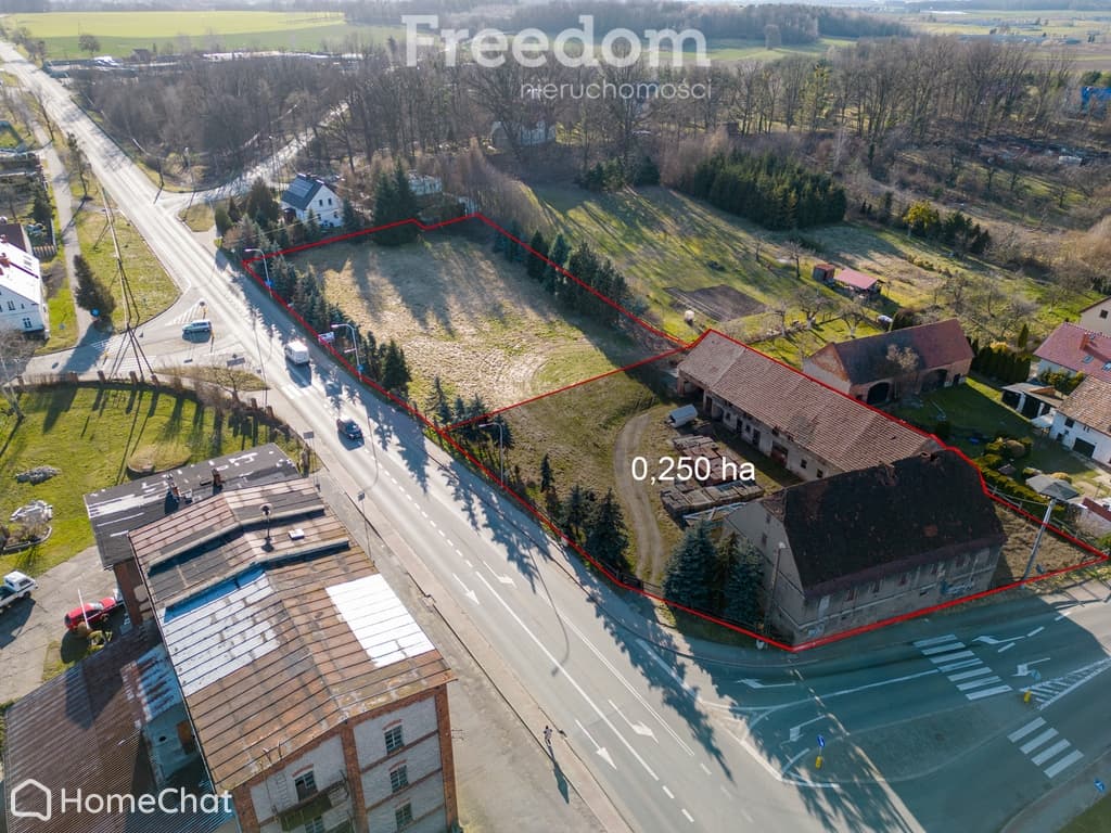 Na sprzedaż działka usługowa 25 ar z zabudowaniami