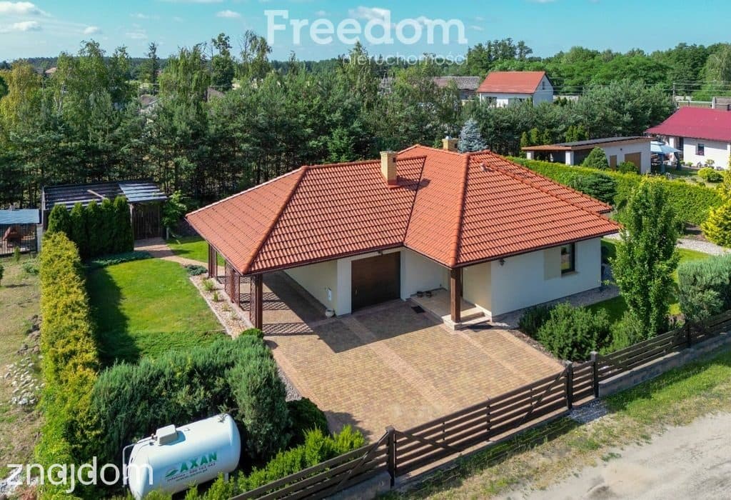 Parterowy dom z ogrodem i garażem 112,6 m²