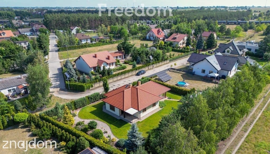 Parterowy dom z ogrodem i garażem 112,6 m² - zdjęcie 4
