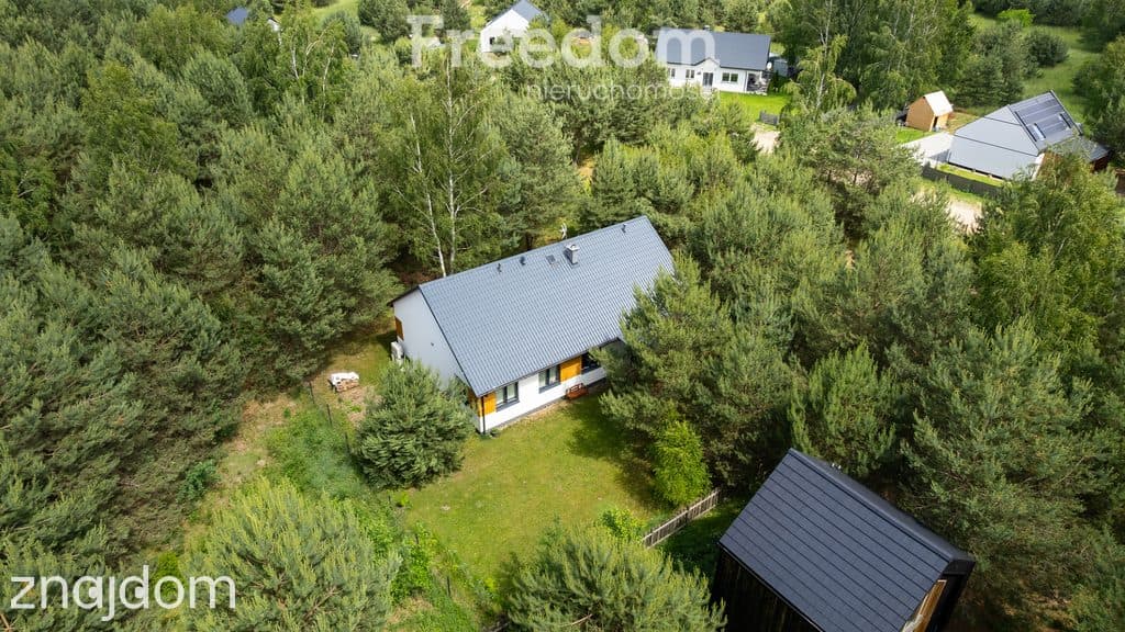 Dom parterowy w otulinie lasu - zdjęcie 19