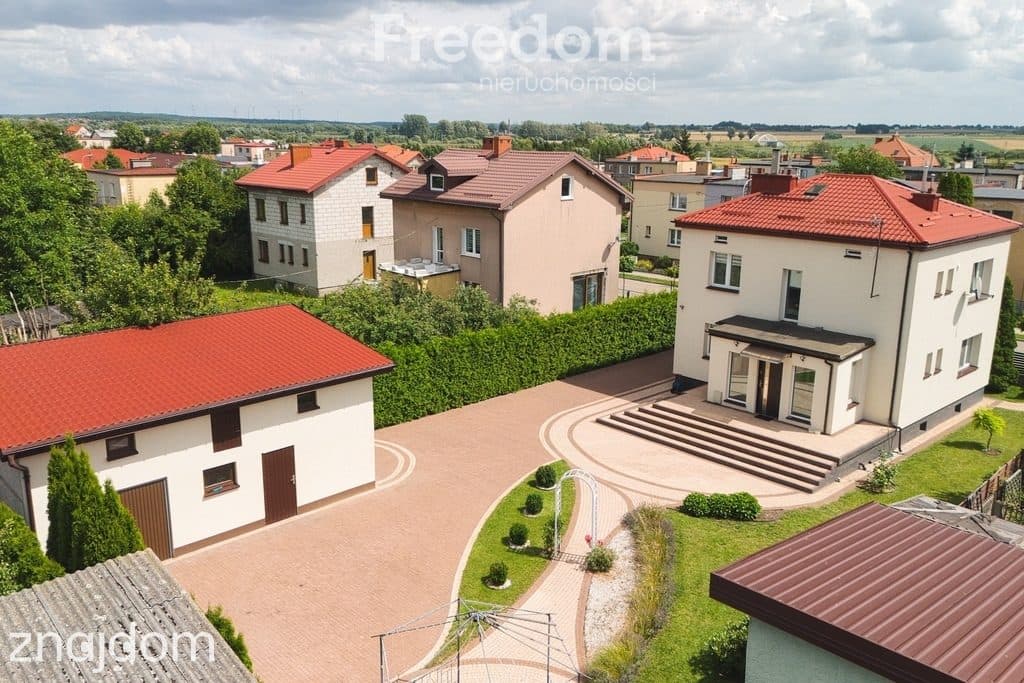 Wyjątkowy dom z gotowym ogrodem i garażem - zdjęcie 3