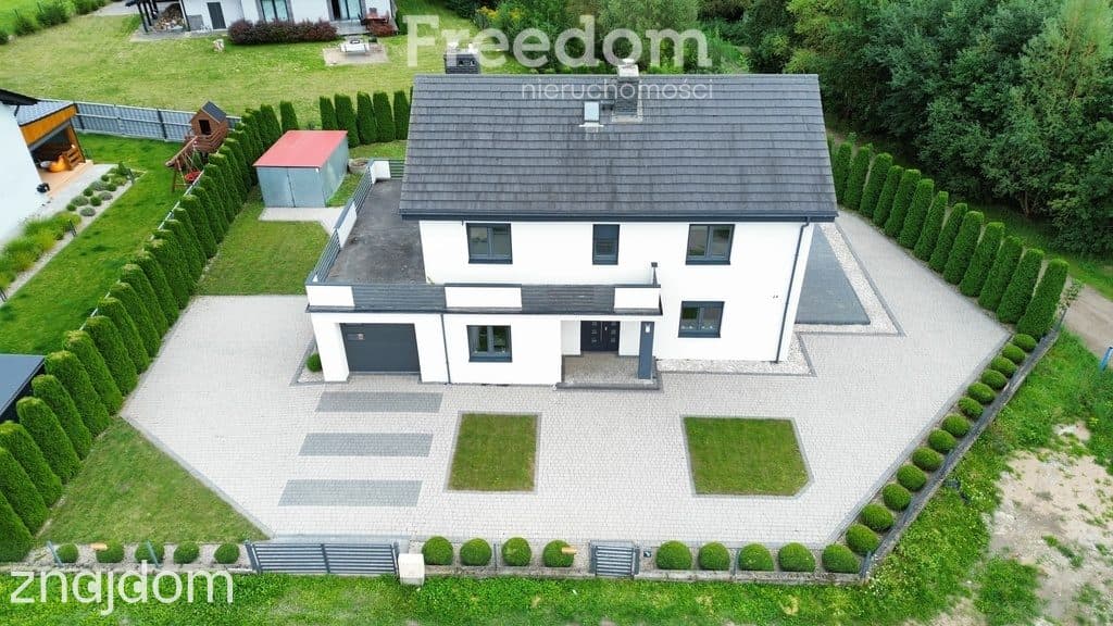 Dom wolnostojący 191 m², działka 945 m², garaż - zdjęcie 2