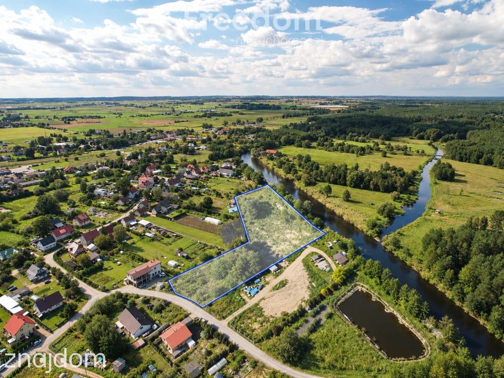 Działka z linią brzegową rzeki i warunkami