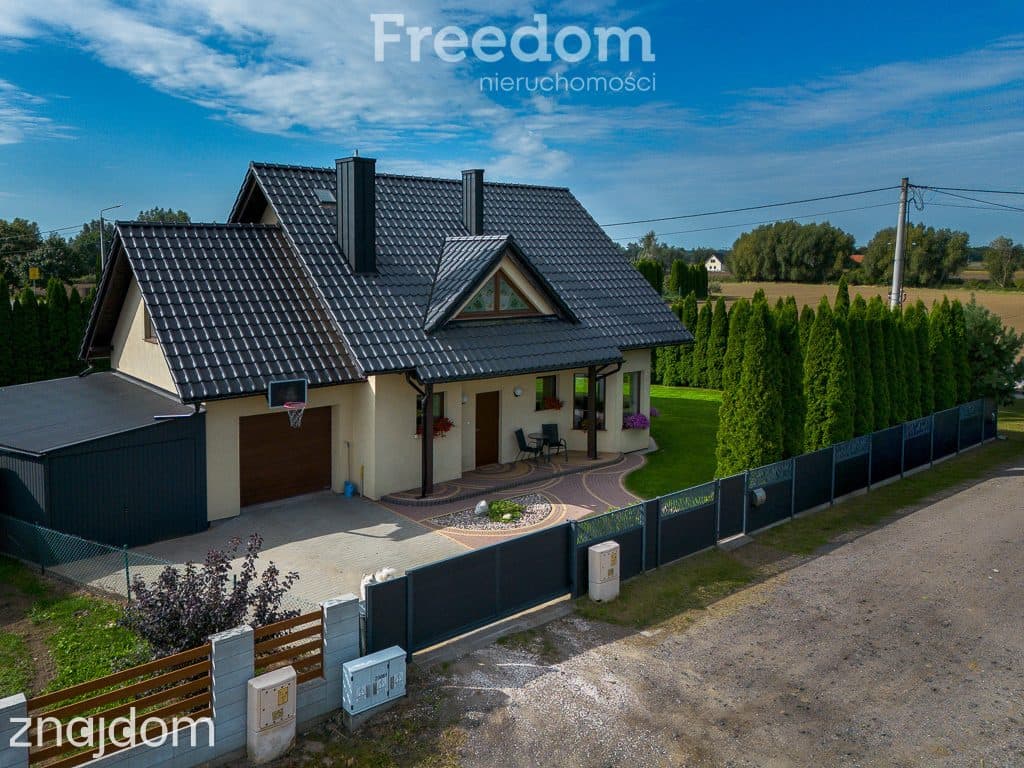 Dom wolnostojący z 5 pokojami i 2 garażami - zdjęcie 2