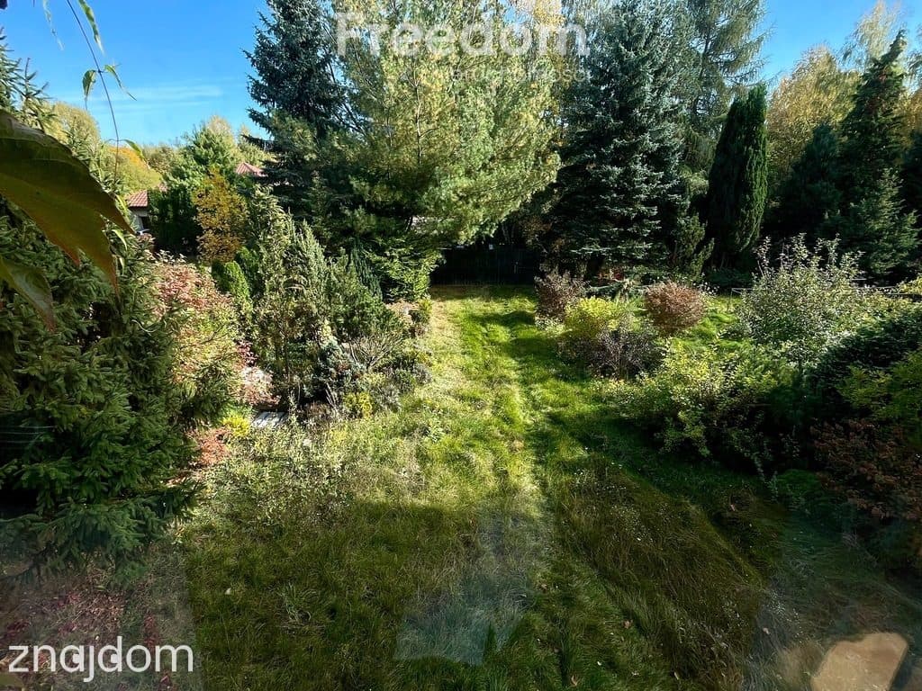 Działka budowlana 1349 m² z domem - Rąbień AB