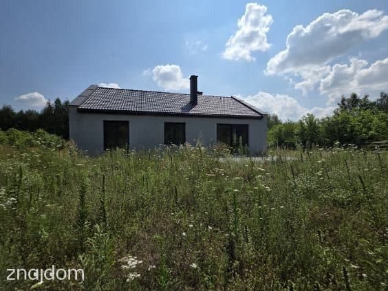 Dom z bardzo funkcjonalnym układem wśród zieleni - zdjęcie 14