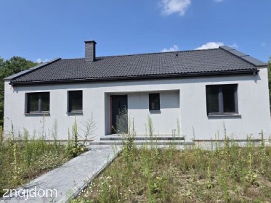 Dom z bardzo funkcjonalnym układem wśród zieleni - zdjęcie 2