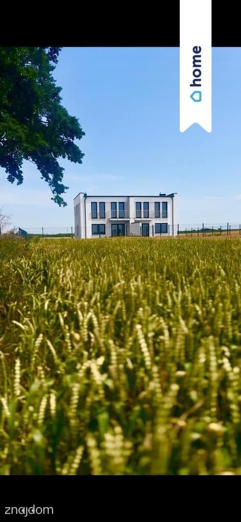 Nowoczesny bliźniak z pompą ciepła | 107,75 m² |