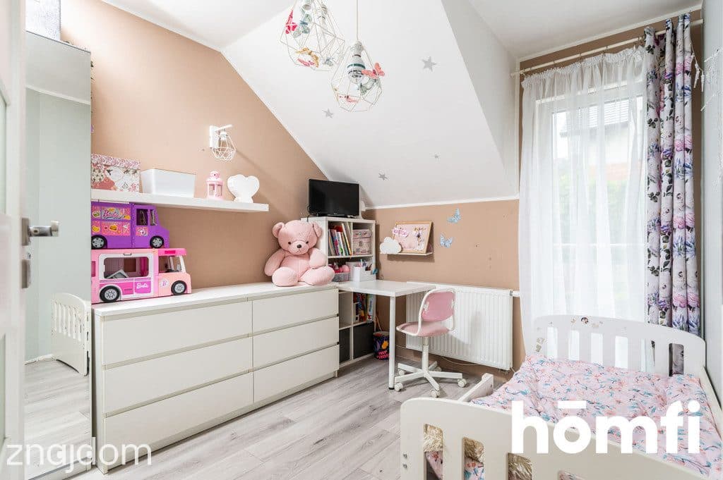 Dom z ogrodem i dodatkowymi 25 m² poddasza - zdjęcie 7