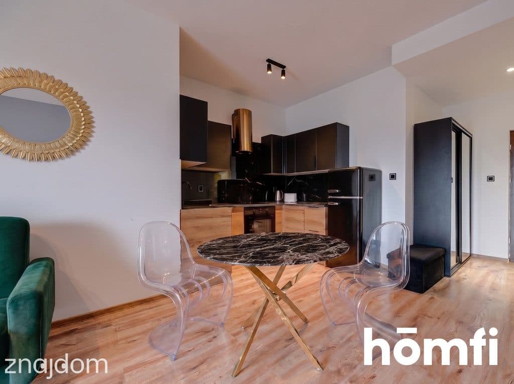 PRZESTRONNA KAWALERKA W APARTAMENTOWCU