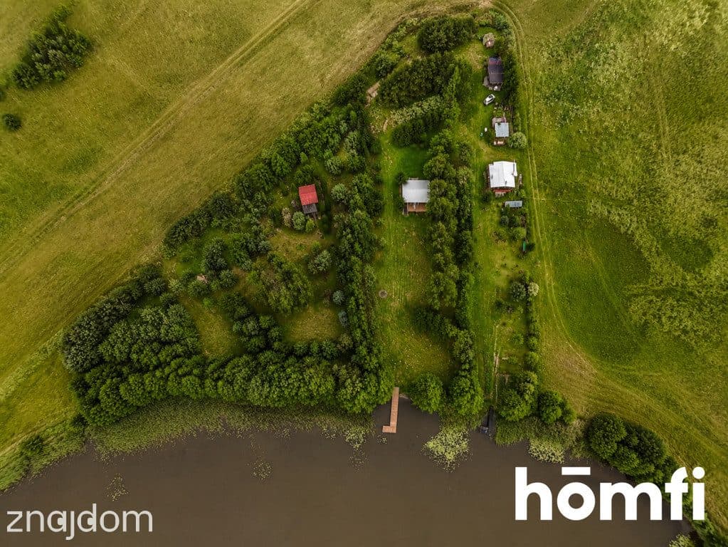 Uroczy dom z linią brzegową i nowym pomostem - zdjęcie 13