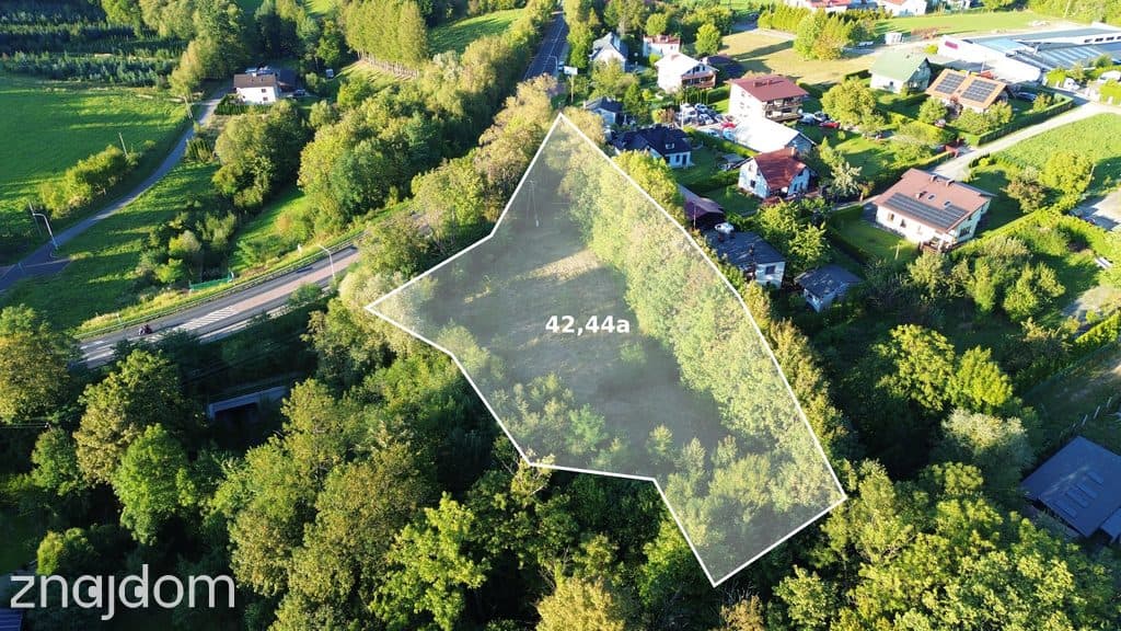 Działka inwestycyjna z gotową koncepcją budynku.