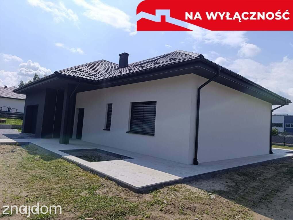 Nowy dom parterowy z antresolą.
