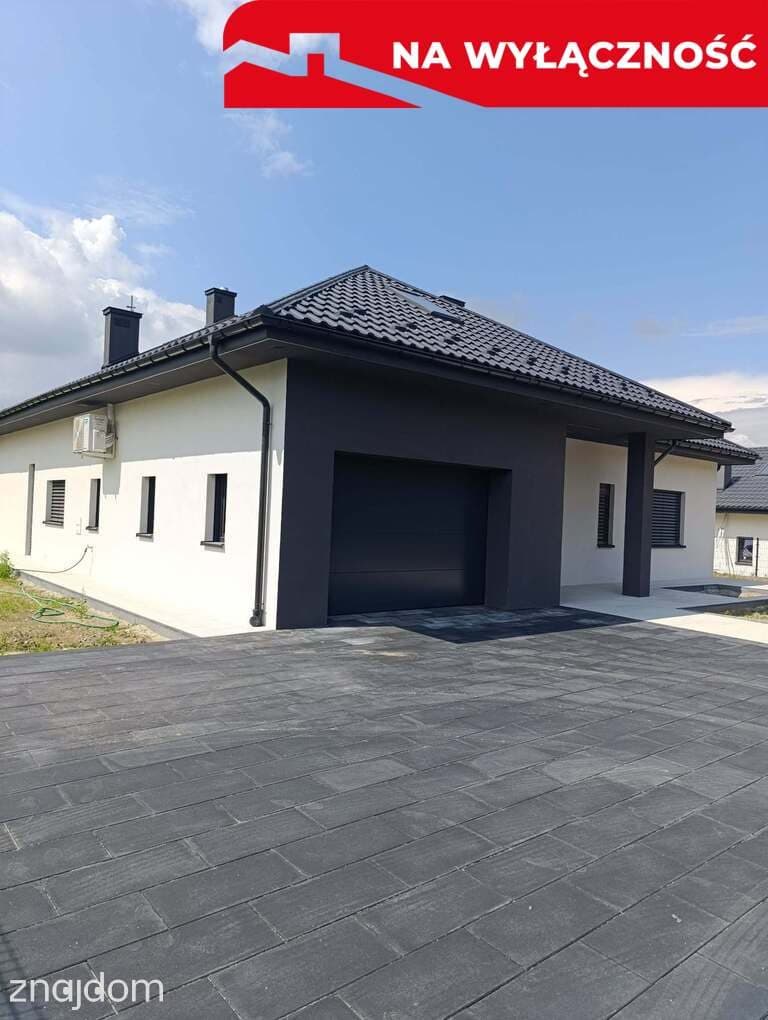 Nowy dom parterowy z antresolą. - zdjęcie 2