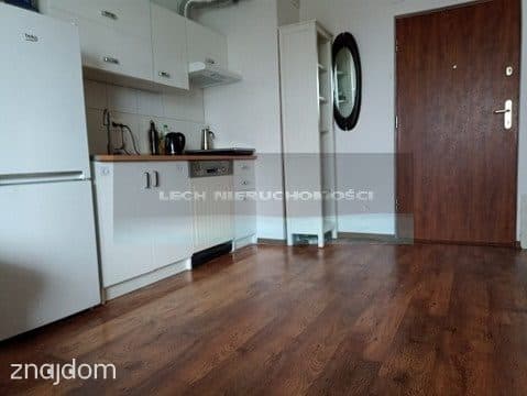 1 pokój z aneksem kuchenynym , balkon, garaż