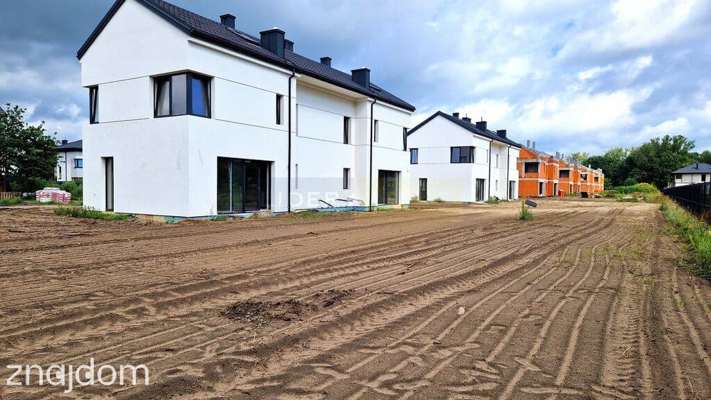 Dwupoziomowe mieszkanie 84,6 m² działką 475m2 - zdjęcie 2