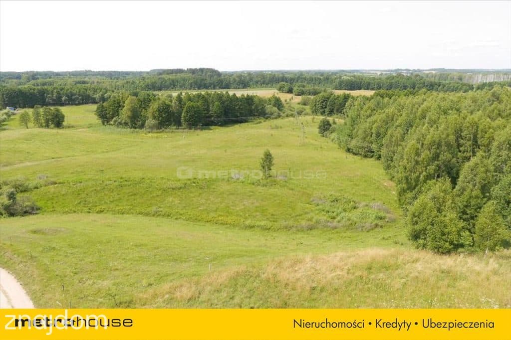 Działka położona w pięknej okolicy nad jeziorem. - zdjęcie 3