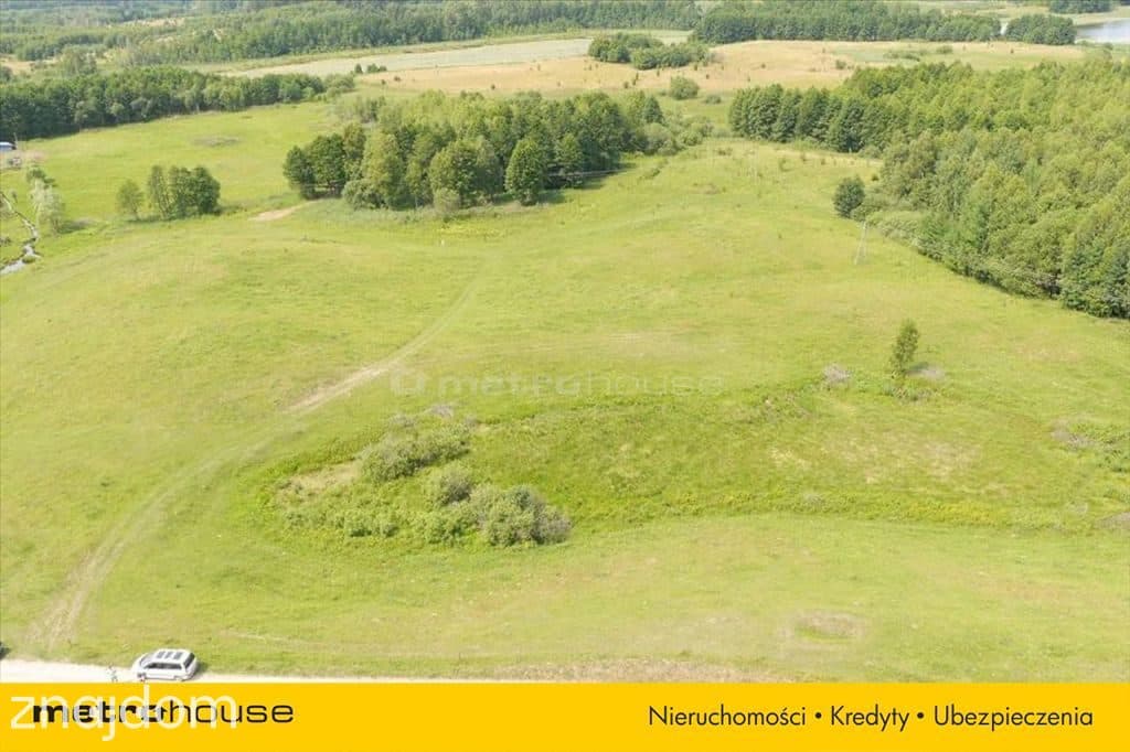 Działka położona w pięknej okolicy nad jeziorem. - zdjęcie 2