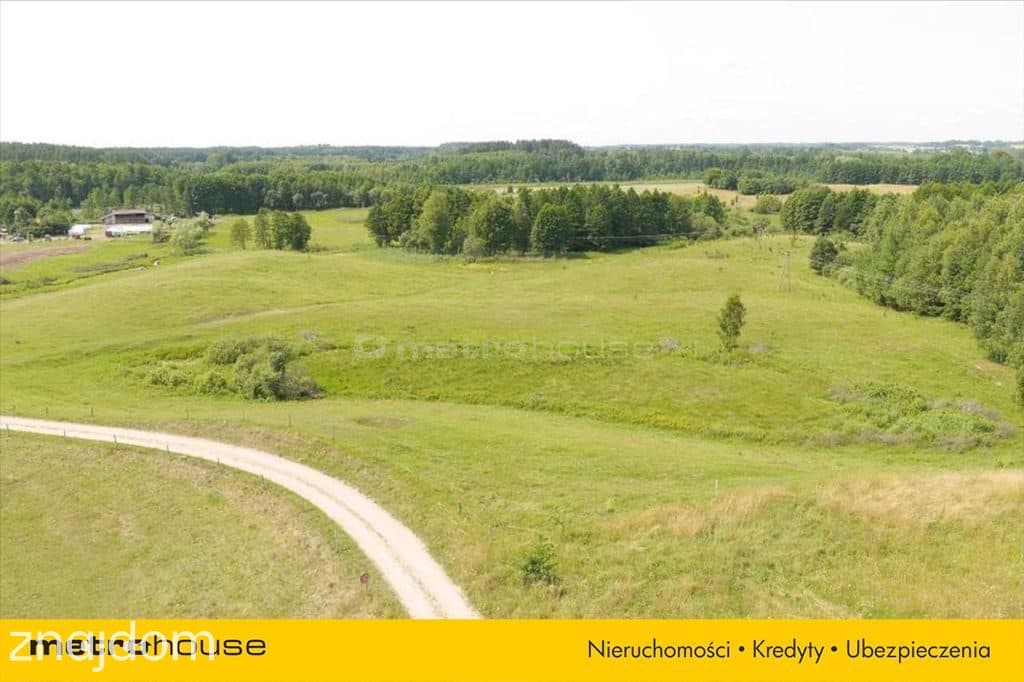 Działka położona w pięknej okolicy nad jeziorem. - zdjęcie 3