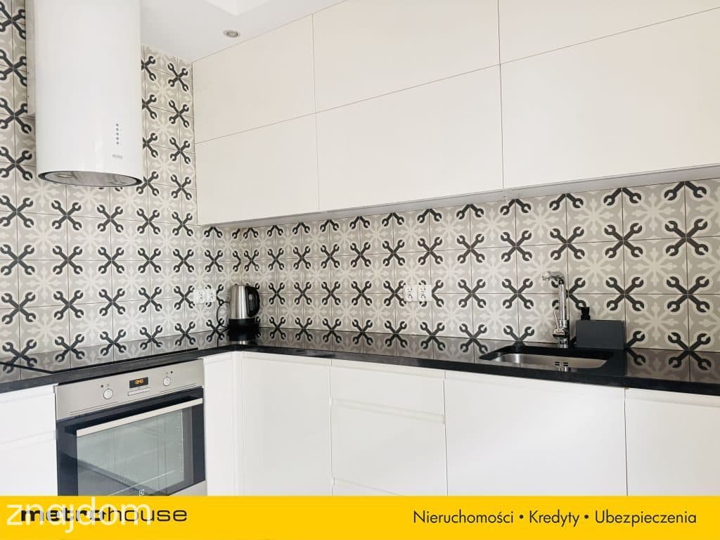 2 pokoje  46,59 m²  Wola  miejsce postojowe - zdjęcie 9
