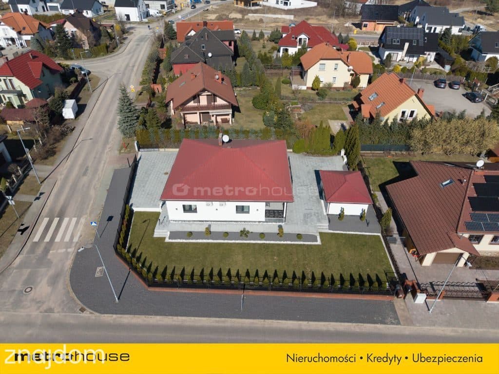Przestronny dom z zadbanym ogrodem i garażem - zdjęcie 18
