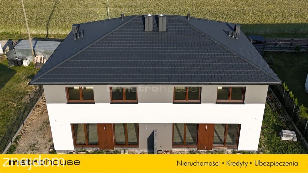 Nowoczesny dom w zabudowie bliźniaczej w Baszkówce - zdjęcie 3
