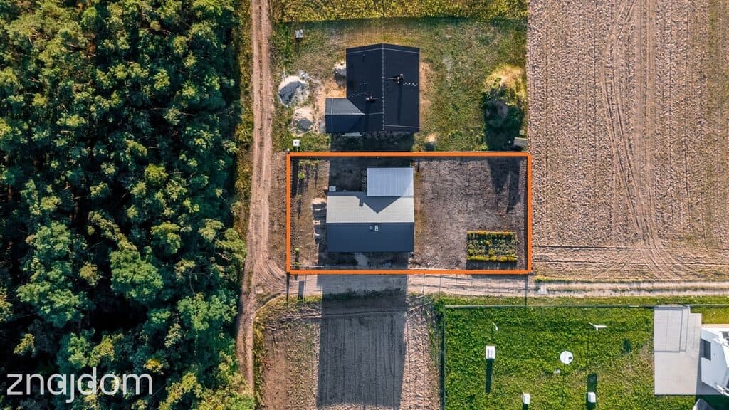 Dom parterowy przy lesie i jeziorze z dużą działką - zdjęcie 10