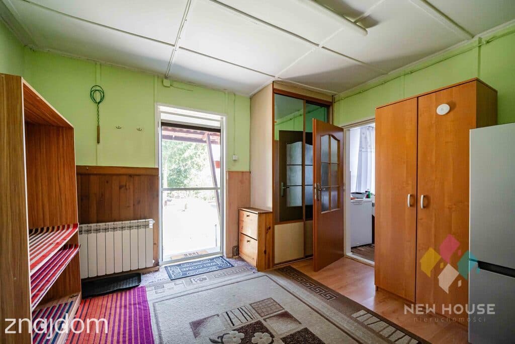 Przestronny dom z 5 pokojami, duża działka - zdjęcie 10