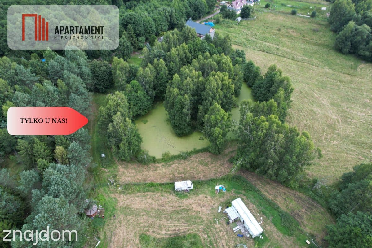Działka ze stawem, linią brzegową rzeki oraz WZ.