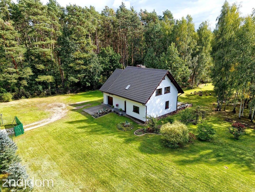 Gotowy do zamieszkania dom w otulinie zieleni na działce 7432 m2 - zdjęcie 2