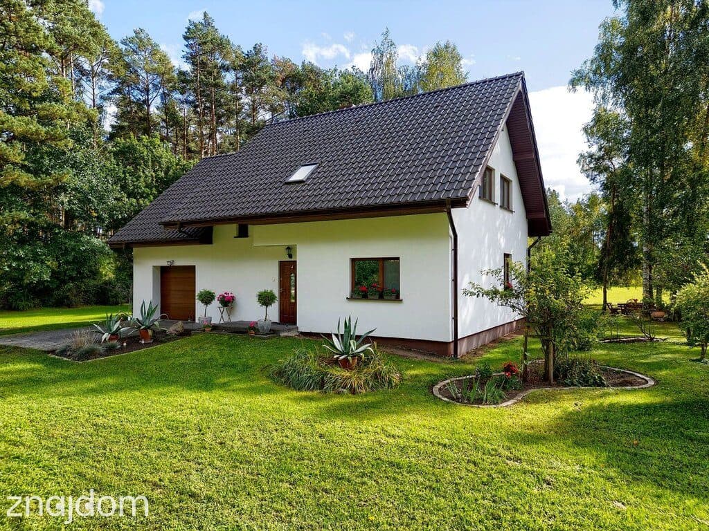 Gotowy do zamieszkania dom w otulinie zieleni na działce 7432 m2