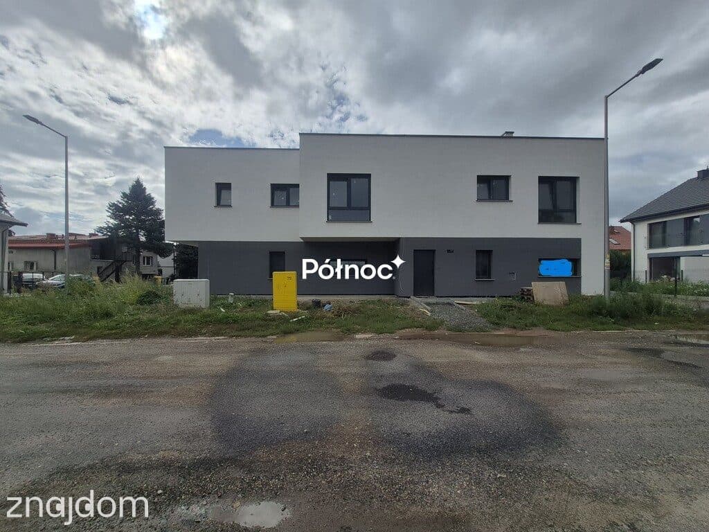 Dom w zabudowie bliźniaczej -os. Sienkiewicza