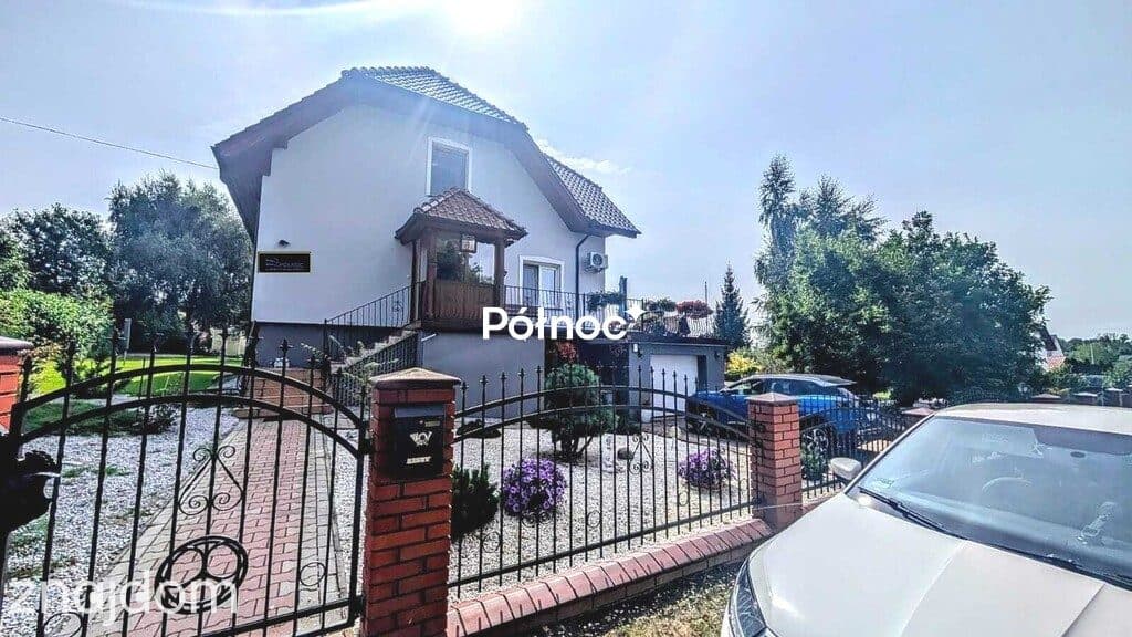 Atrakcyjny dom z piękną działką w Nowogrodźcu - zdjęcie 4