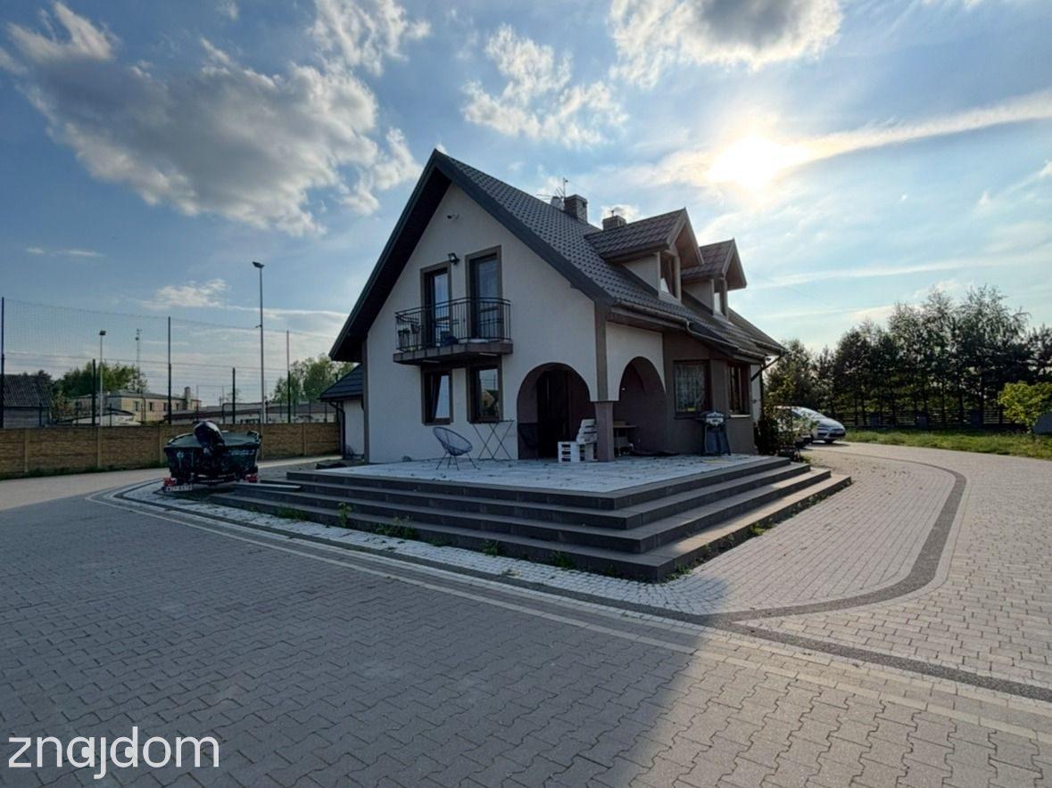 Siedlisko z pięknym domem i własnym stawem - zdjęcie 9