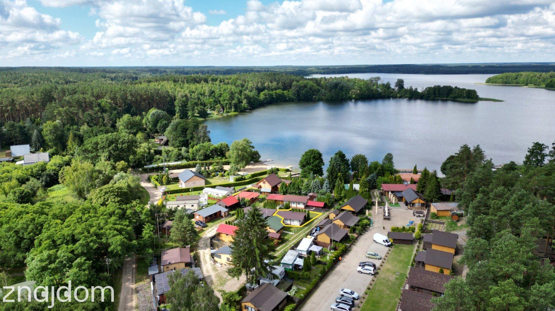Działka rekreacyjna z domkiem nad jeziorem. - zdjęcie 3