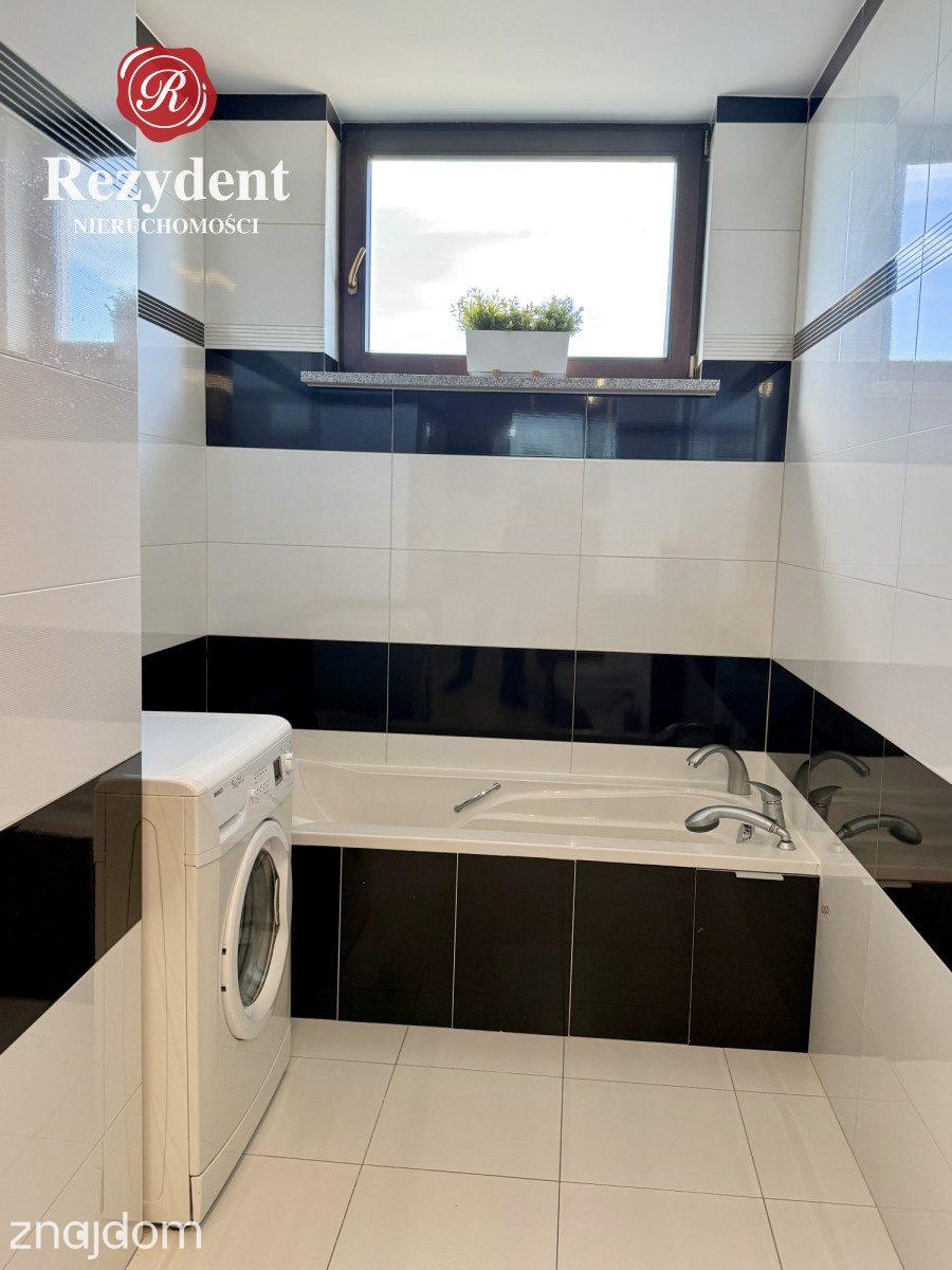 Przestronny apartament na obrzeżach centrum miasta - zdjęcie 12