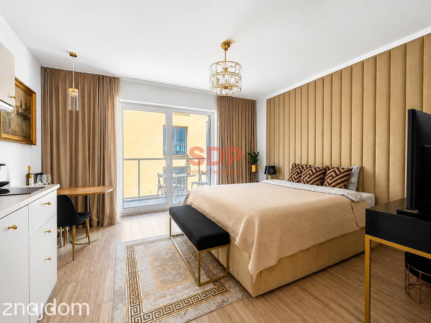 Małe mieszkanie w apartamentowcu przy Rynku (przy rzece)