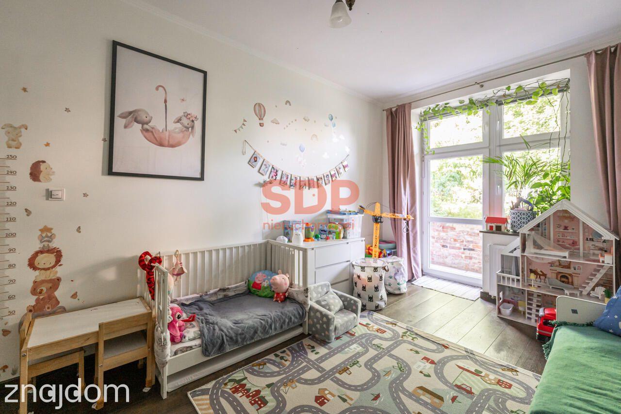Klimatyczna kamienica po remoncie: 60 m², dębowe podłogi, balkon - zdjęcie 11